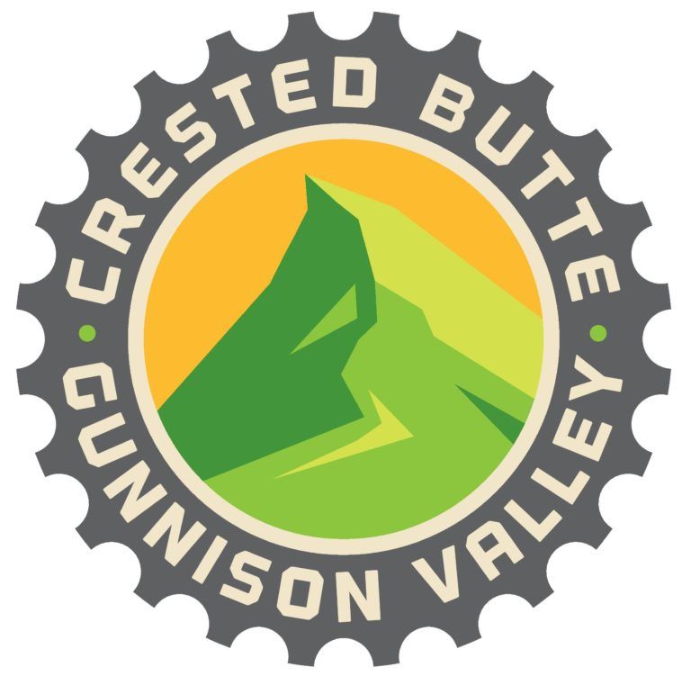 Crested Butte, Gunnison Valley logo: green mountain in a yellow circle surrounded by a gray gear and text.