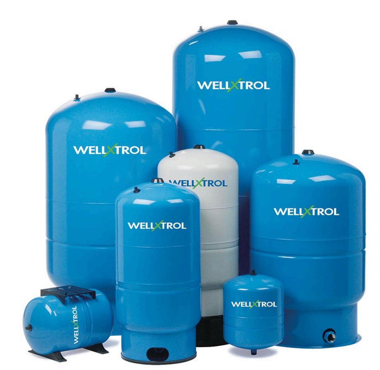 A group of blue and white Well X Trol water storage tanks of various sizes.