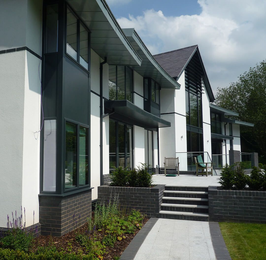A large white building with stairs leading up to it