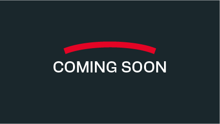 A sign that says `` coming soon '' on a black background.