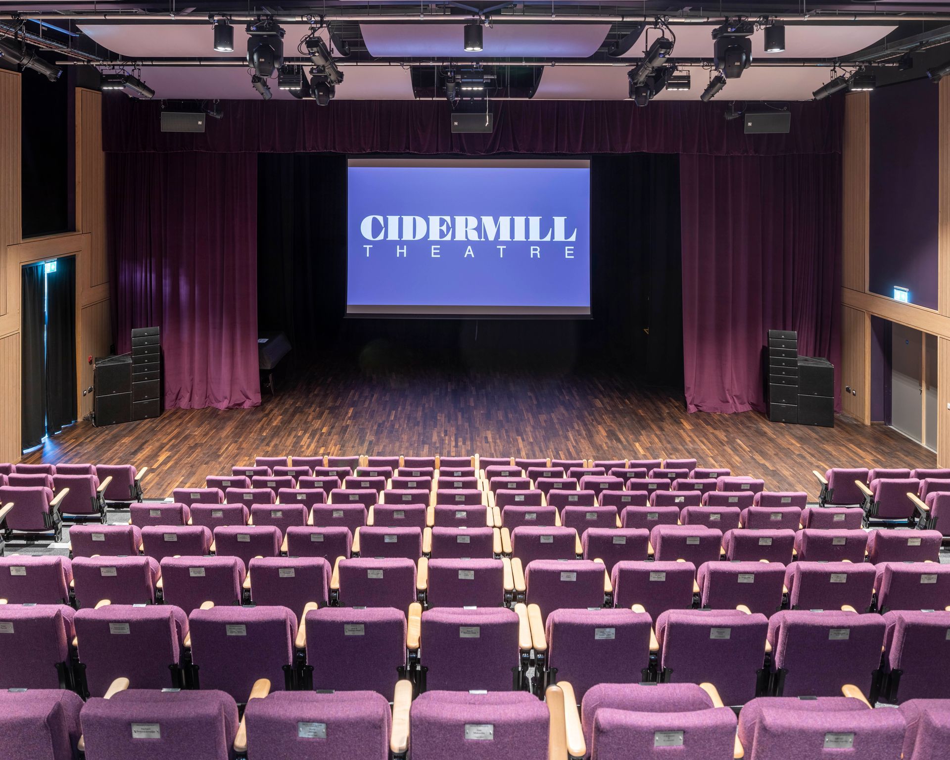 Chipping Campden, A large auditorium with purple seats and a large screen that says cidermill theatre