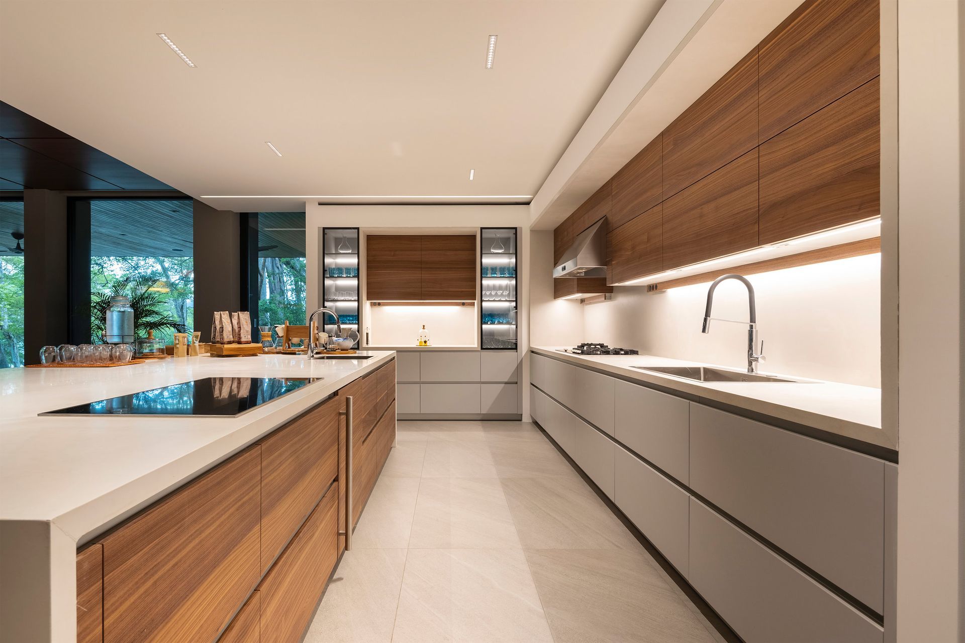 a kitchen with wooden cabinets and white counter tops