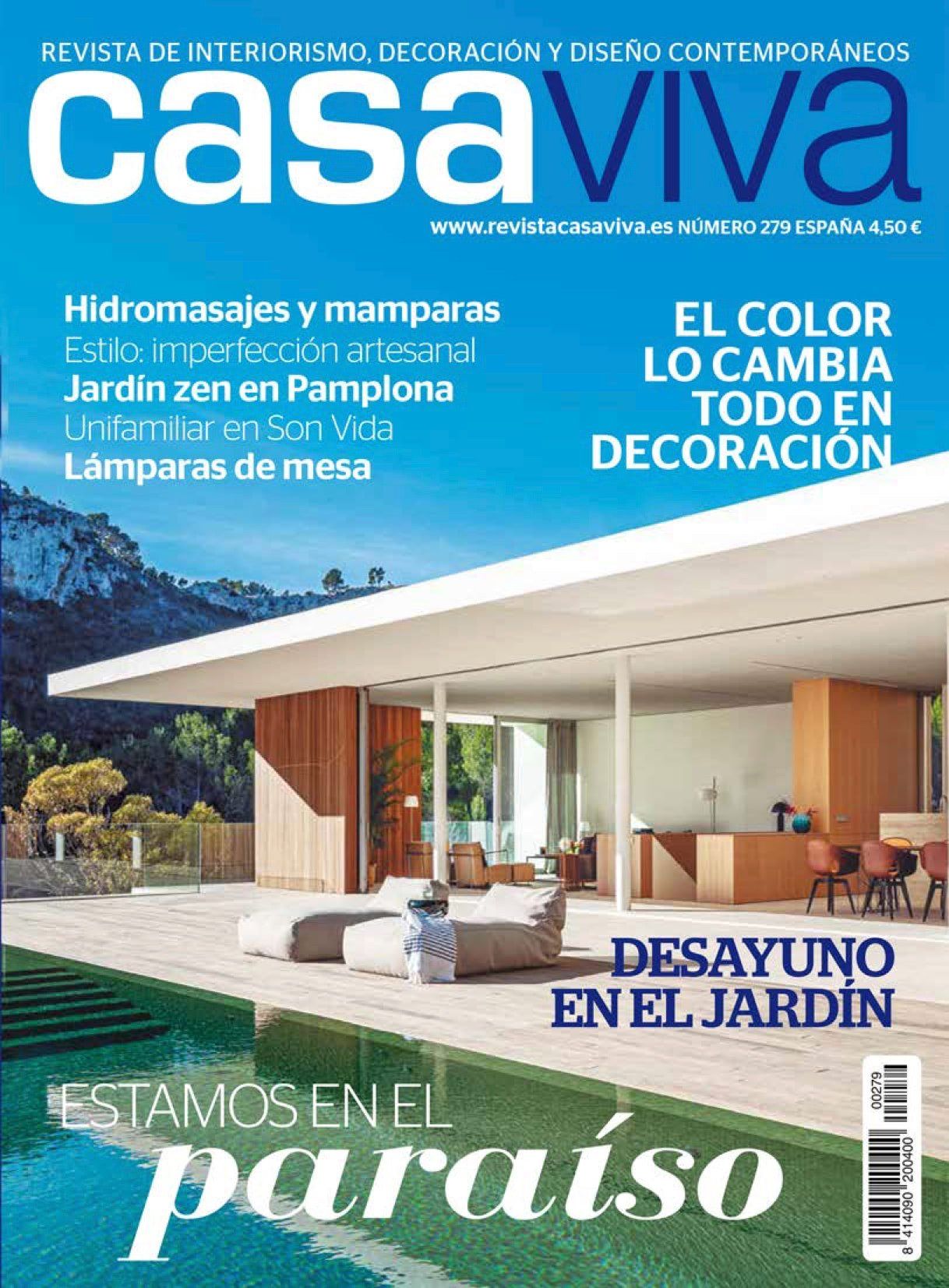 a magazine called casaviva has a house on the cover