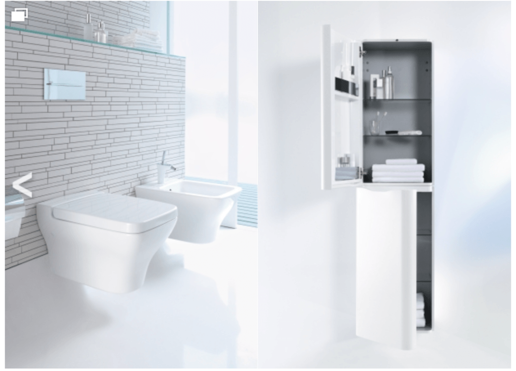 a bathroom with a toilet , bidet and medicine cabinet .