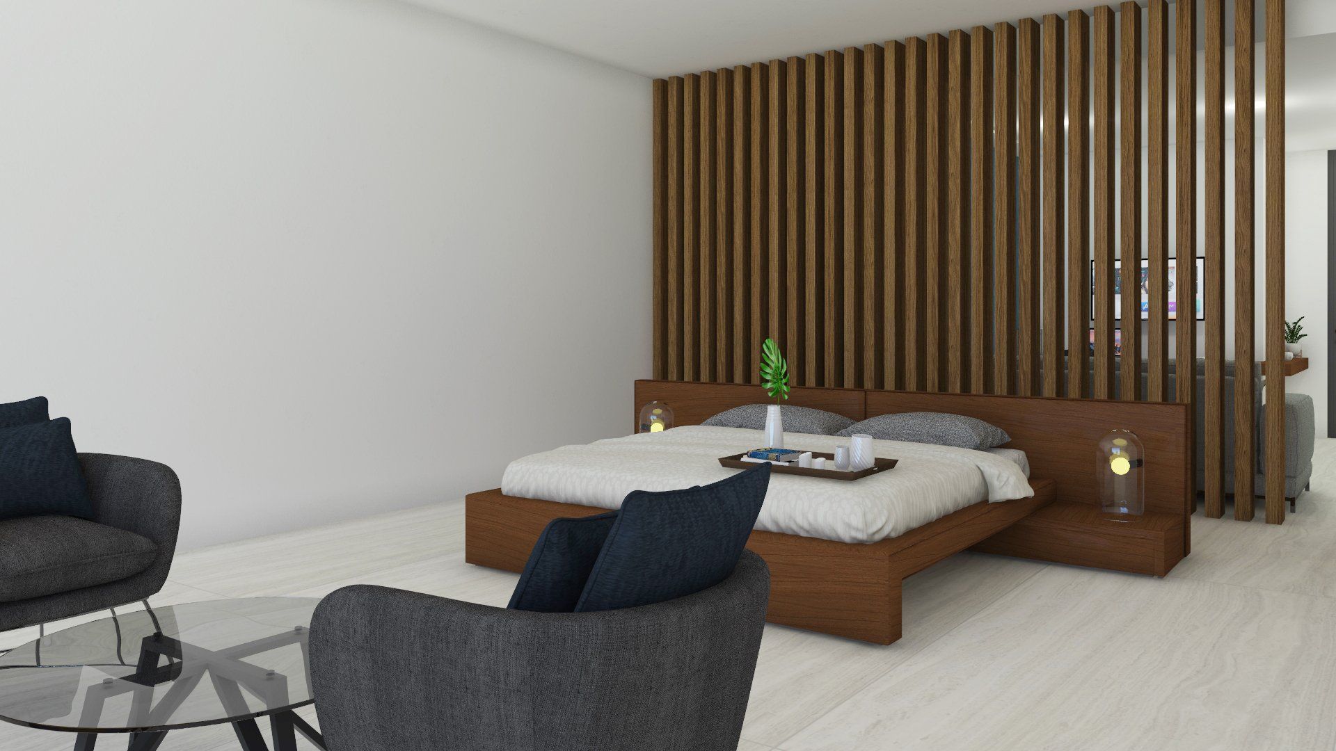 a bedroom with a bed , chairs and a table