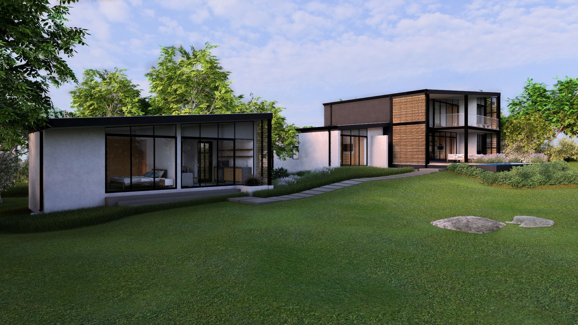 a couple of houses are sitting on top of a lush green hillside .