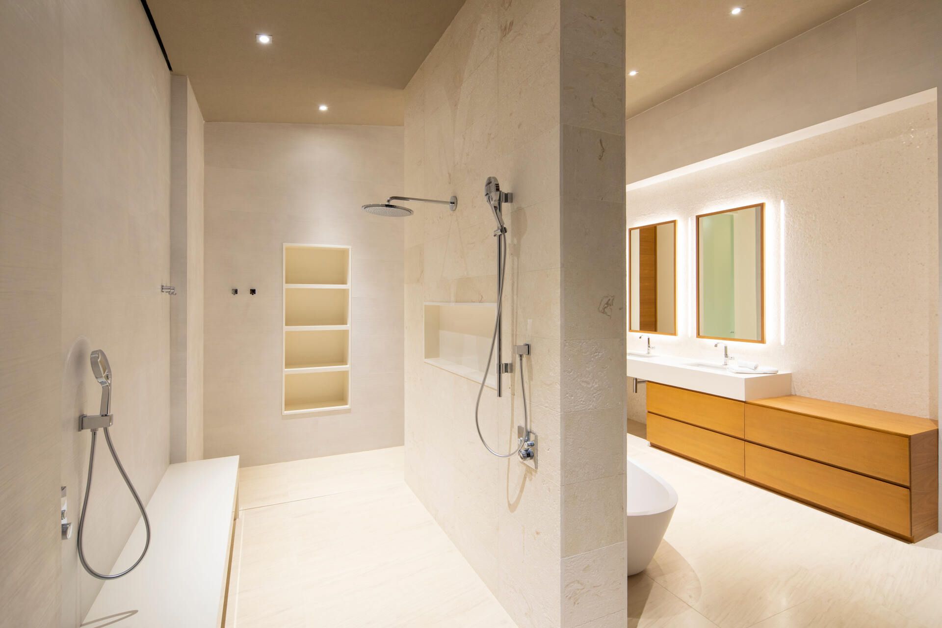 a bathroom with a walk in shower and a sink .