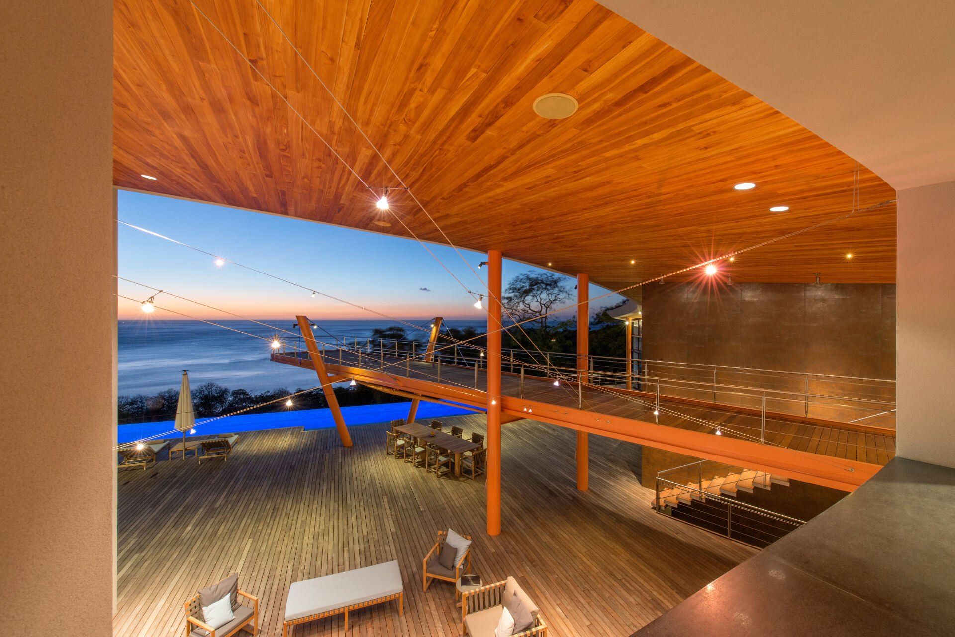 a view of the ocean from the inside of a building