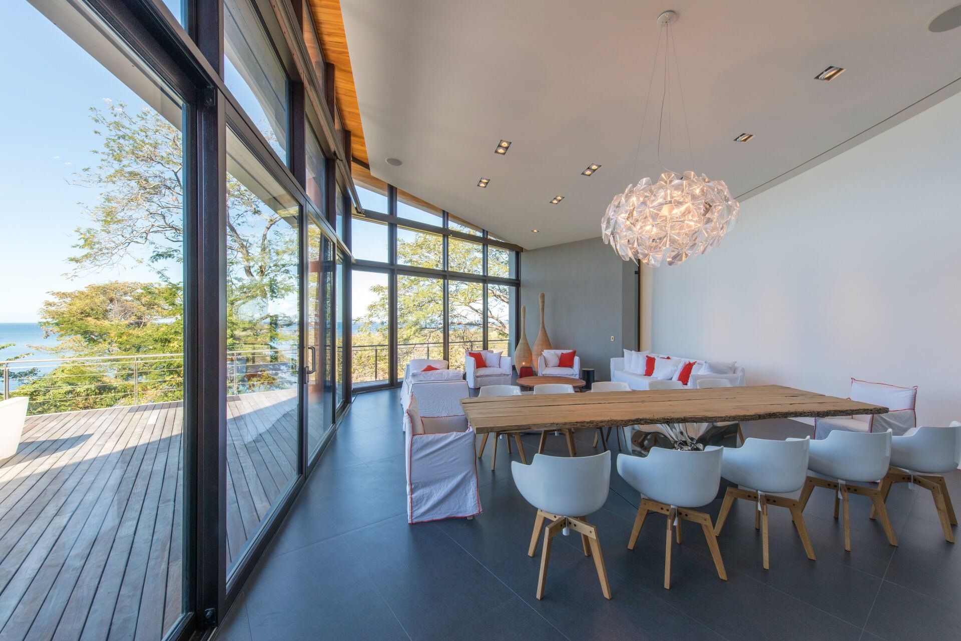 a dining room with a large table and chairs