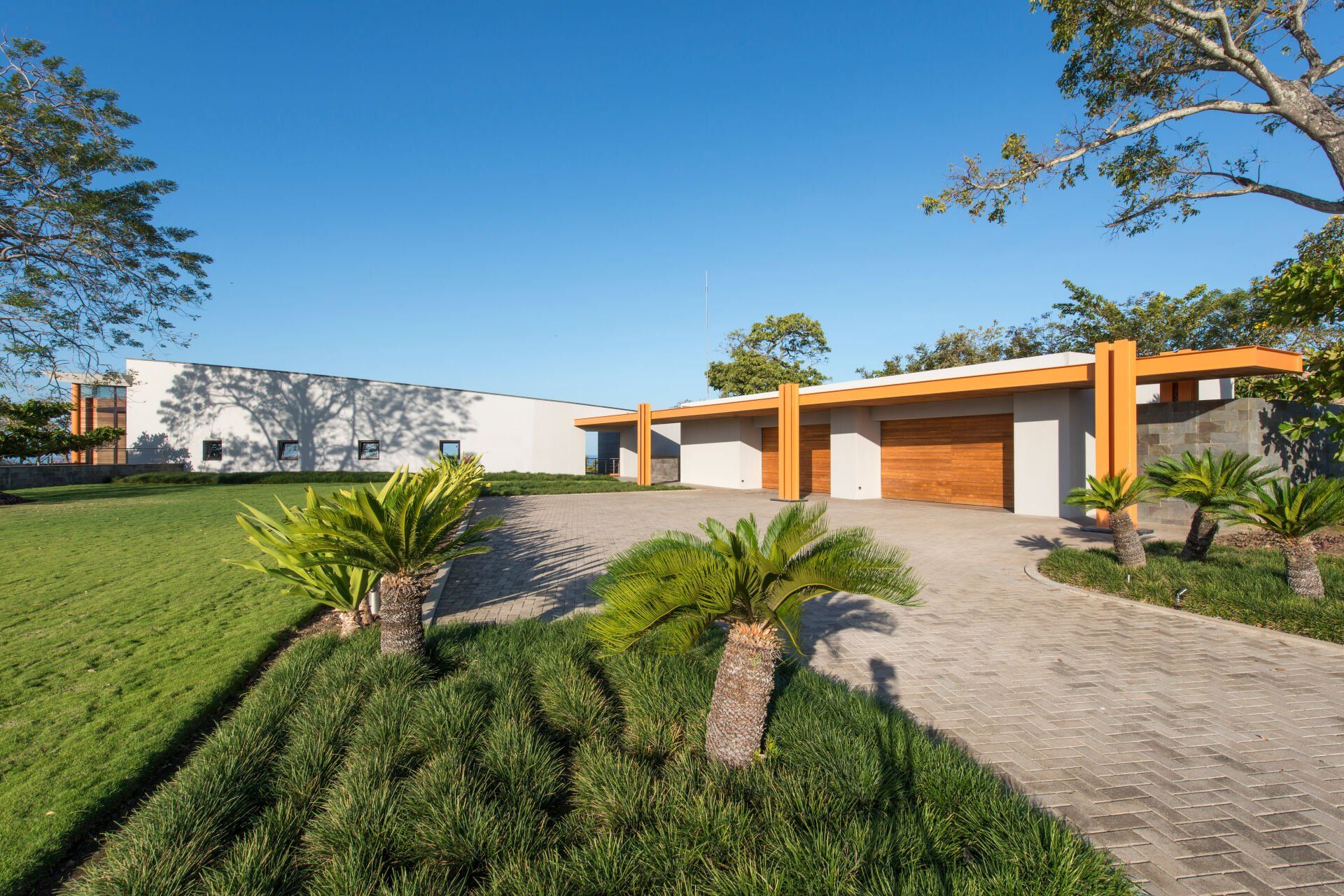 a large house with a driveway leading to it