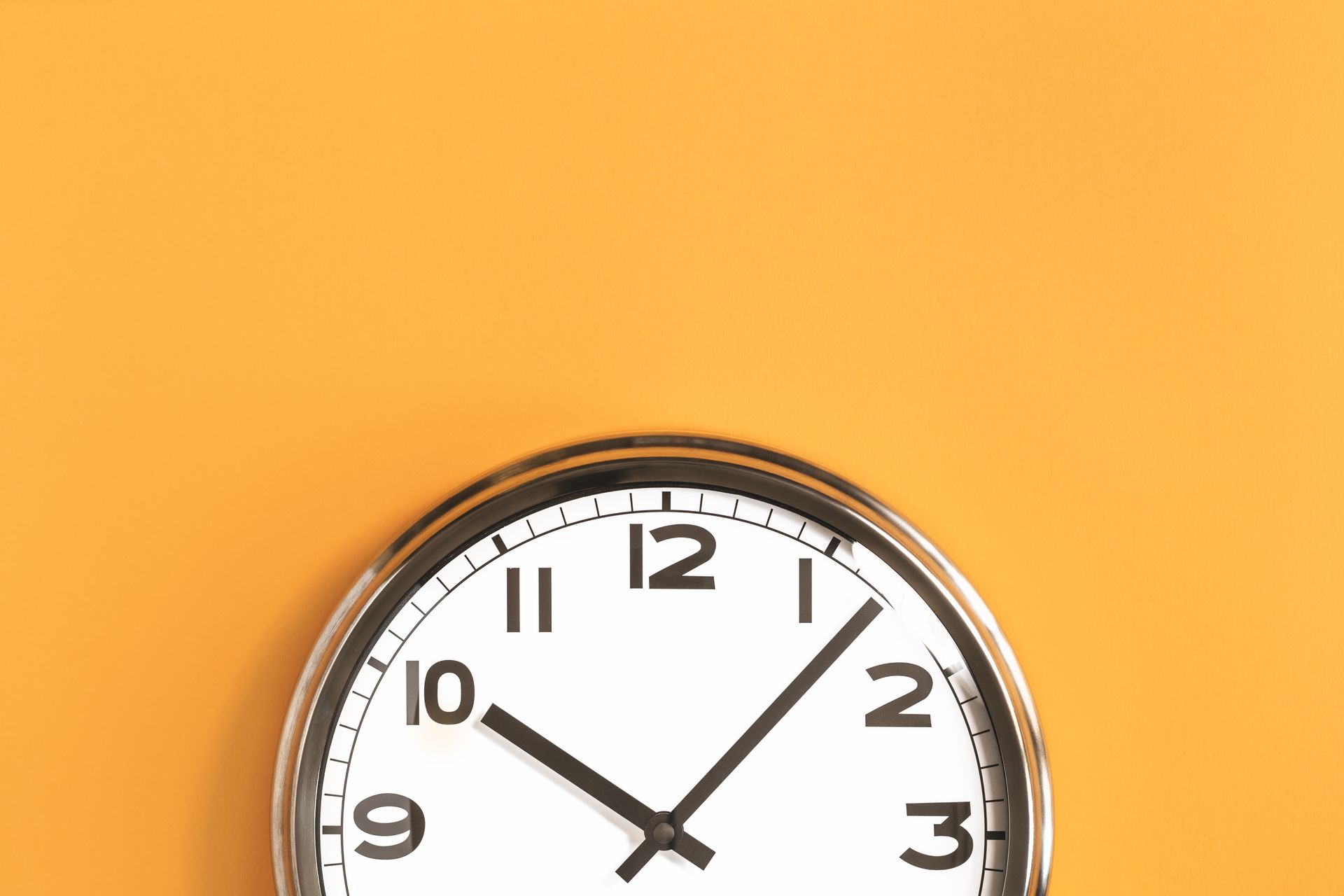 A clock with a orange background