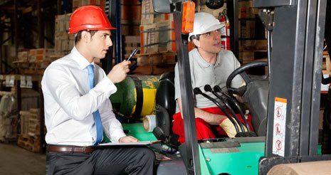 instructor with forklift operator