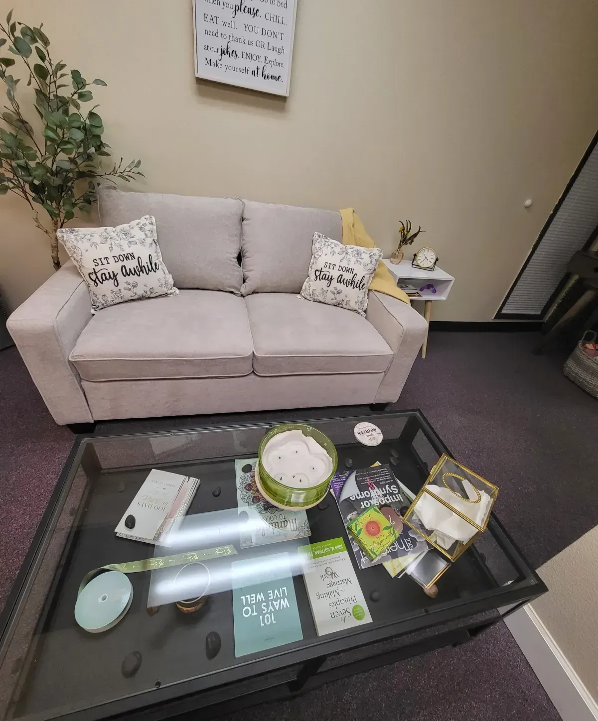 A living room with a couch and a coffee table