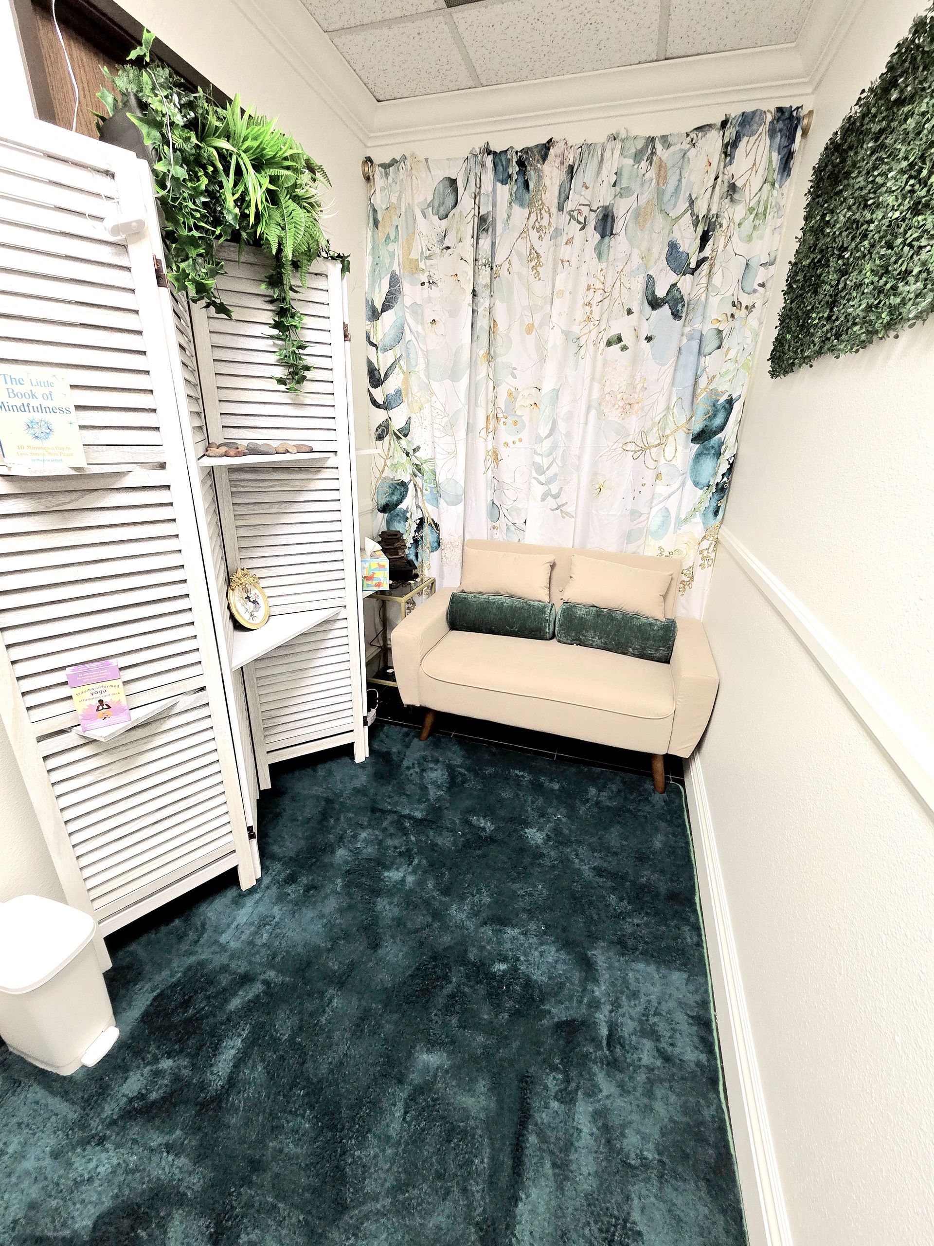 There is a couch in the middle of the room.