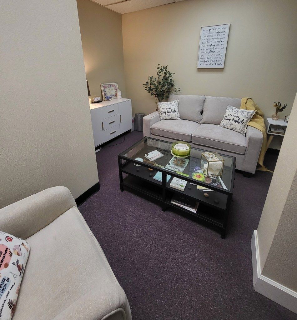 A living room with a couch and a coffee table