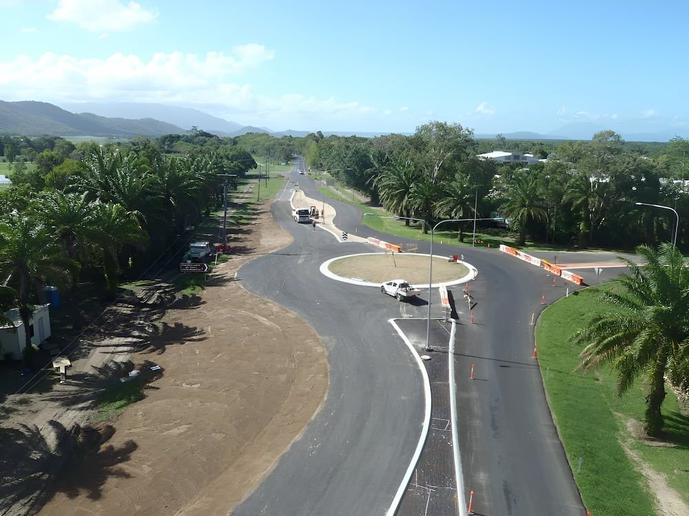 An Aerial View Of A Road With A Roundabout In The Middle — S & K Raw Materials & Earthmoving in Atherton, QLD