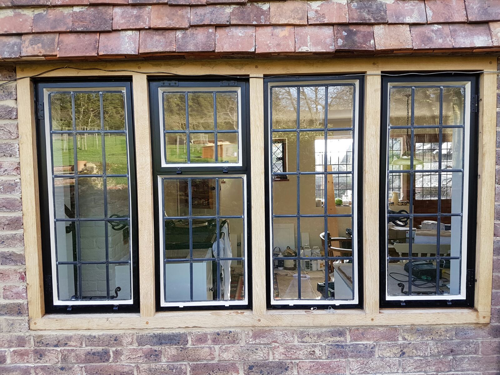 Black metal window with white accent