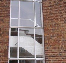 Windows with brick walls