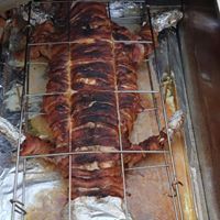 Image of whole barbecued alligator