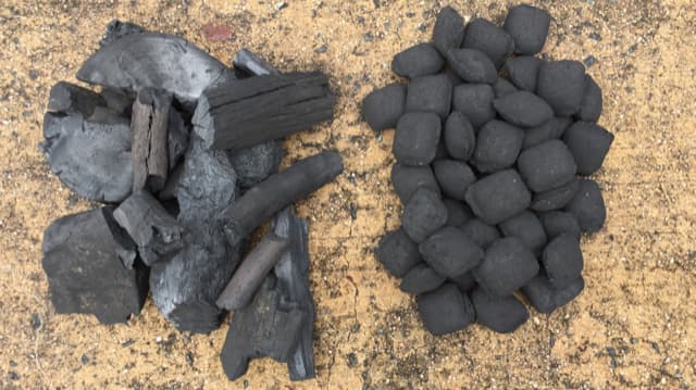 Samples of lump charcoal compared to charcoal briquets