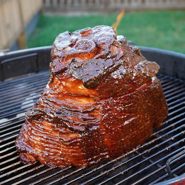 Glazed Ham cooking on grill