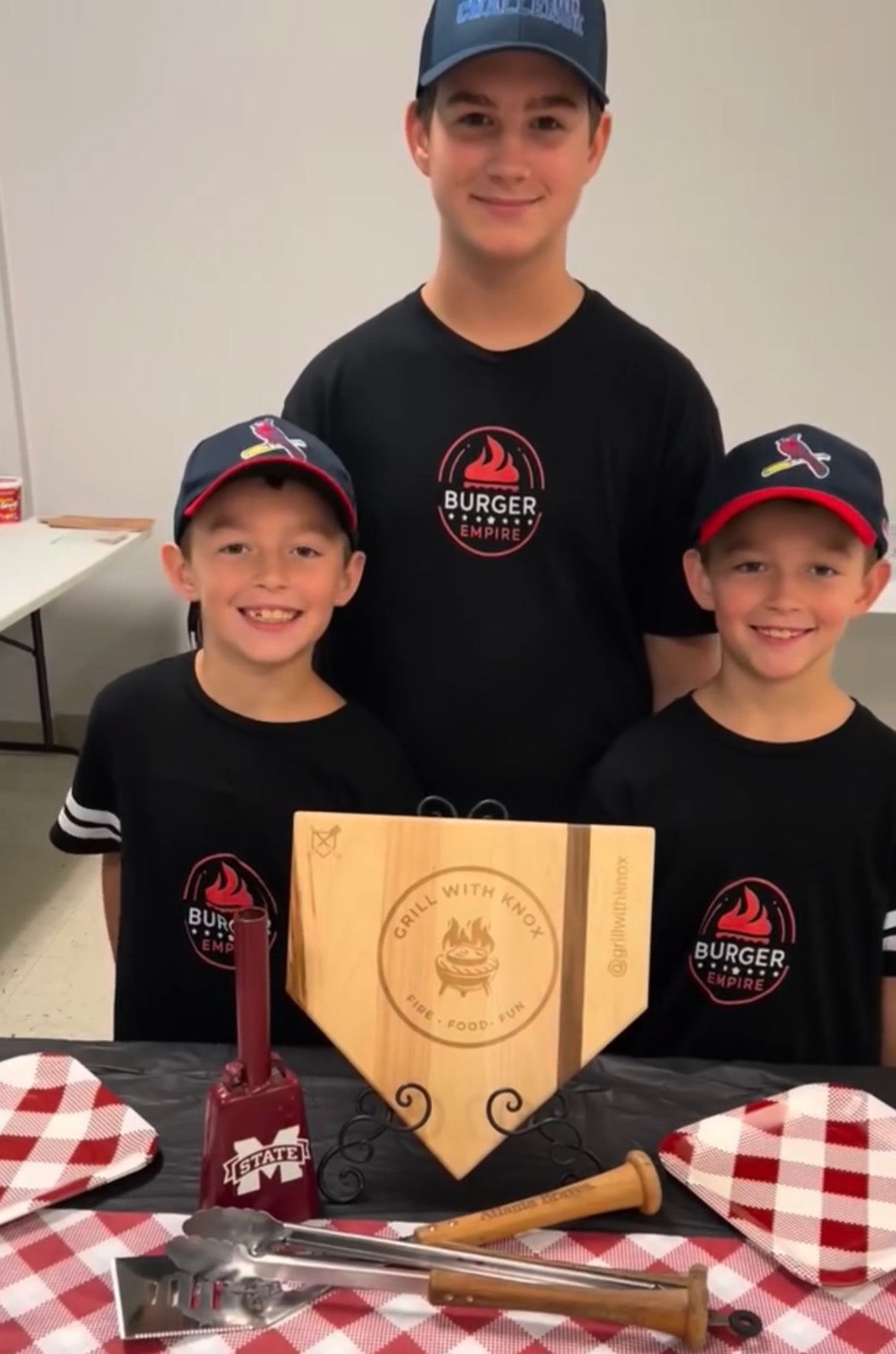 Knox Roundsaville Team B&B Future All Star  and brothers with trophy