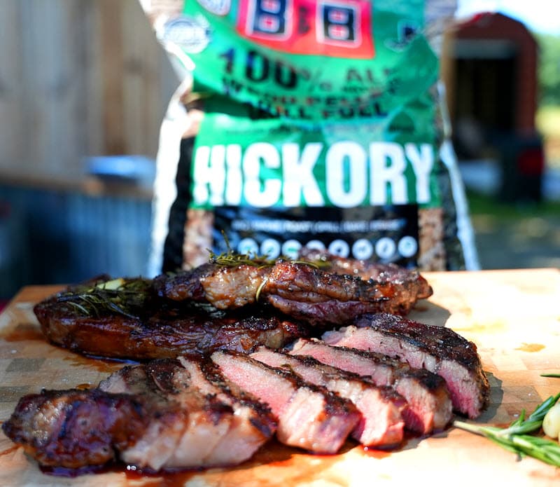 Sliced Steak with bag of B&B Hickory Pellets in the background