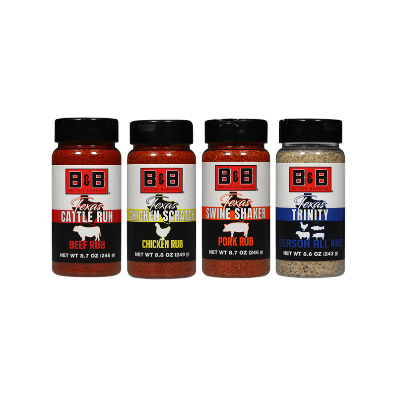 Four B&B barbecue seasoning bottles: Beef Rub (white & red bottle), Chicken Rub (white & yellow bottle), Pork Rub (white & orange bottle), and Season All Rub (white & blue bottle).
