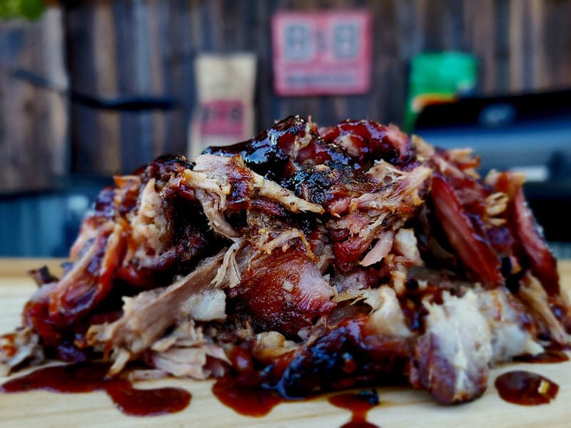 Pile of shredded smoked and sauced pork butt