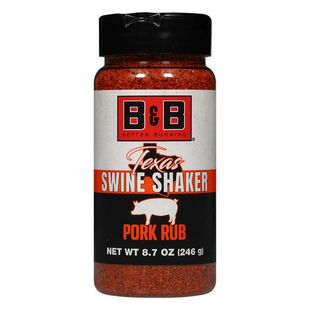 Bottle of B&B Texas Swine Shaker pork rub. Red and black label on a bottle of red powder.