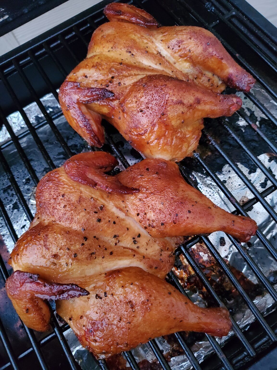 Cornish Game Hens cooking on grill