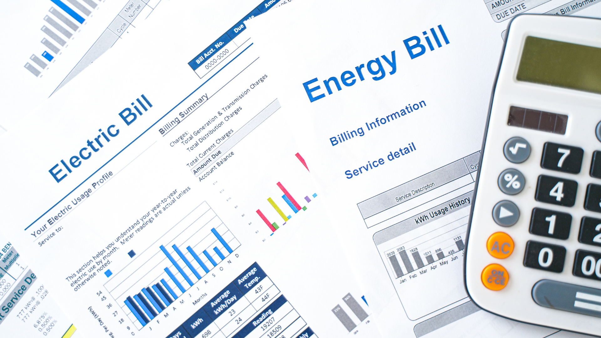 Energy and electric bills with charts, graphs, and a calculator, on a white background.