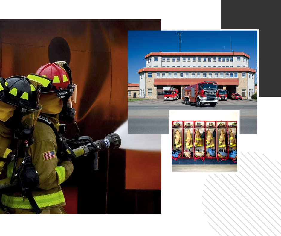 Two firefighters are spraying water on a fire with a fire truck in the background.