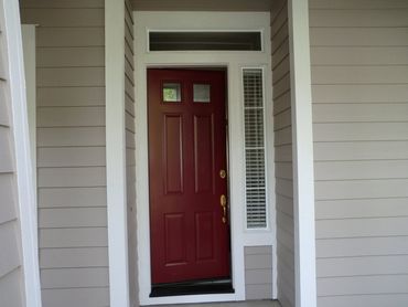 Exterior Re-Painting — Red door with white siding in Carson CIty, NV