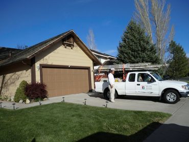 Exterior Staining — Garage and truck parked in Carson CIty, NV