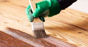 Interior Staining — Painter staining the wood in Carson CIty, NV
