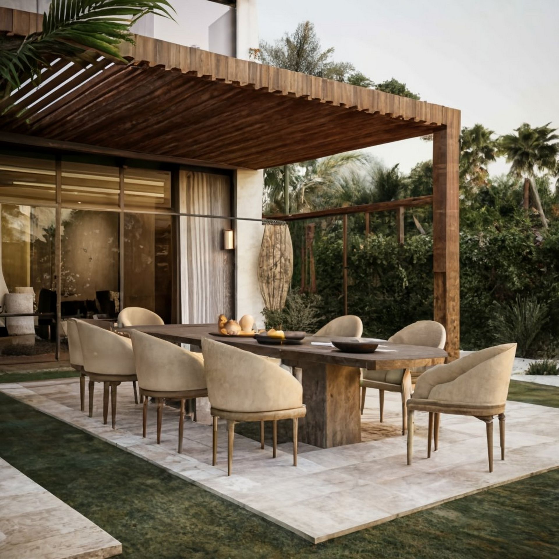 A patio with a table and chairs under a pergola