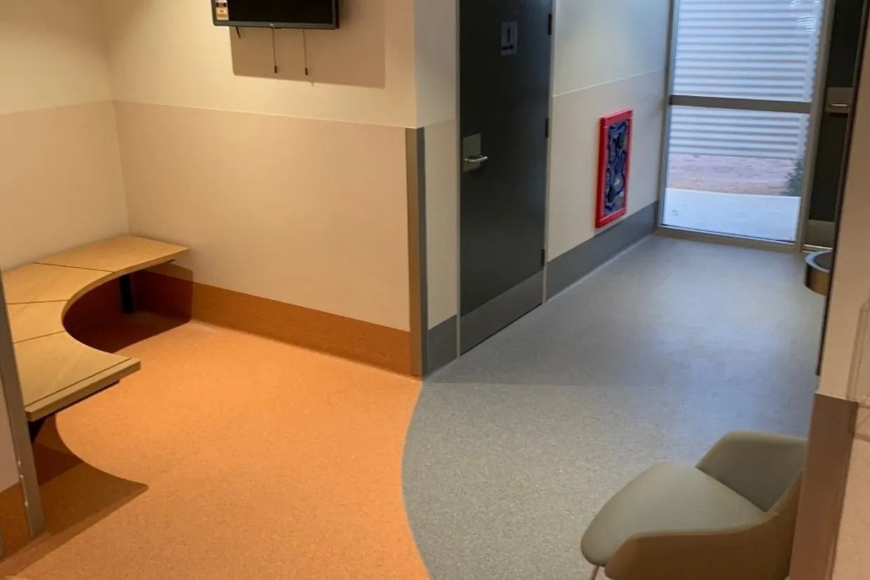 Hallway With Bench, Door, and Chair — Ozwide Flooring In Ciccone, NT