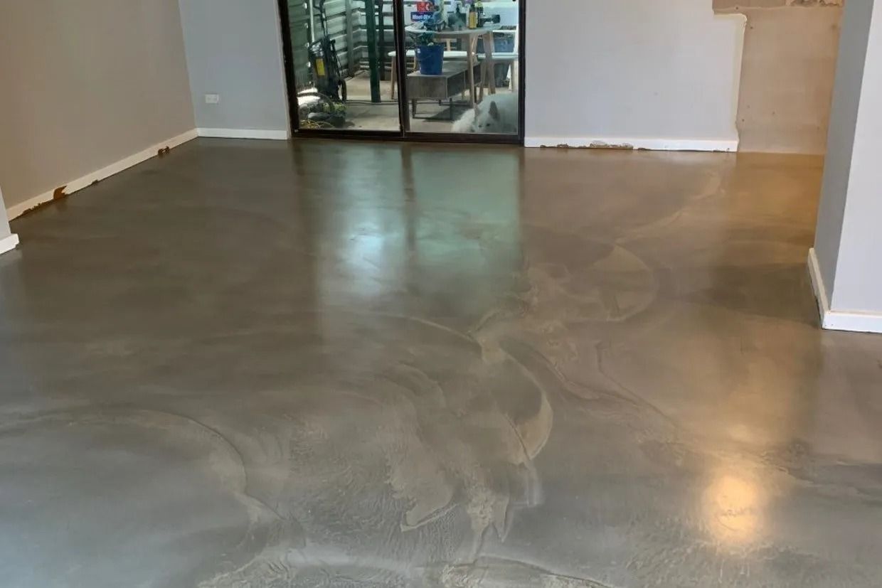 Metallic Epoxy Floor in a Room With Large Glass Doors. Silver and Grey Tones — Ozwide Flooring In Tennant Creek, NT