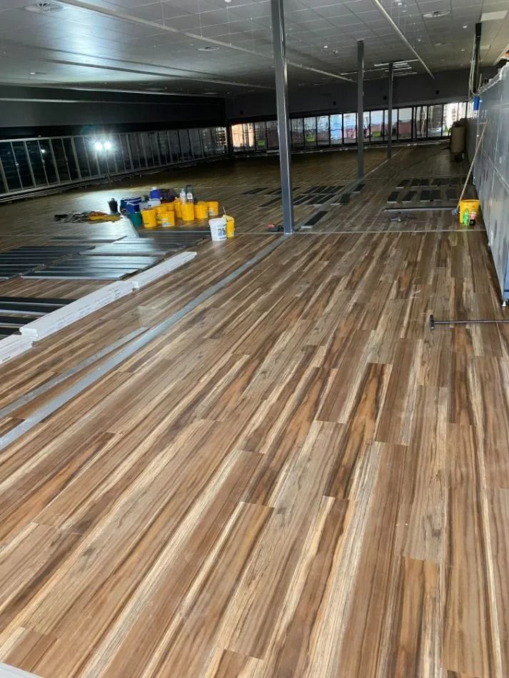 Newly Installed Hardwood Floor in a Large Commercial Space — Ozwide Flooring In Ciccone, NT