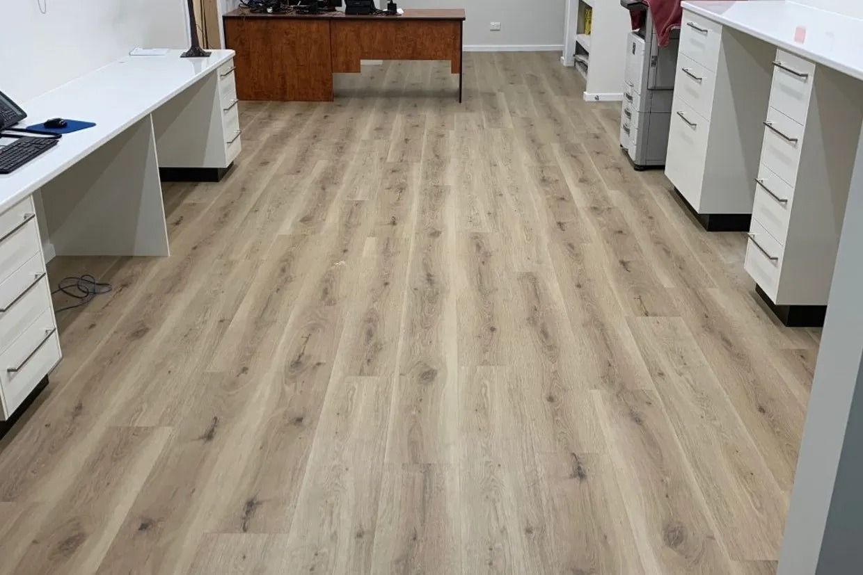 Office Interior With Light Wood-look Flooring, Desks With White Cabinets — Ozwide Flooring In Ciccone, NT