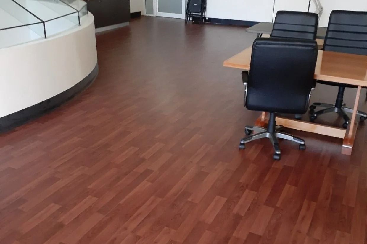 Dark Wooden Floor in Office Setting — Ozwide Flooring In Alice Springs, NT