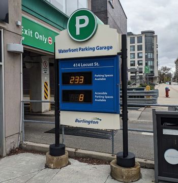 A sign for the waterfront parking garage says exit only