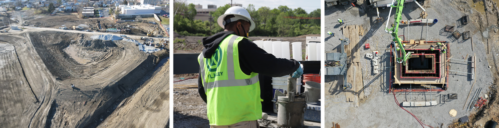 A man in a yellow vest is standing in front of a construction site.