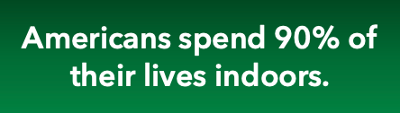 A green background with white text that says americans spend 90 % of their lives indoors