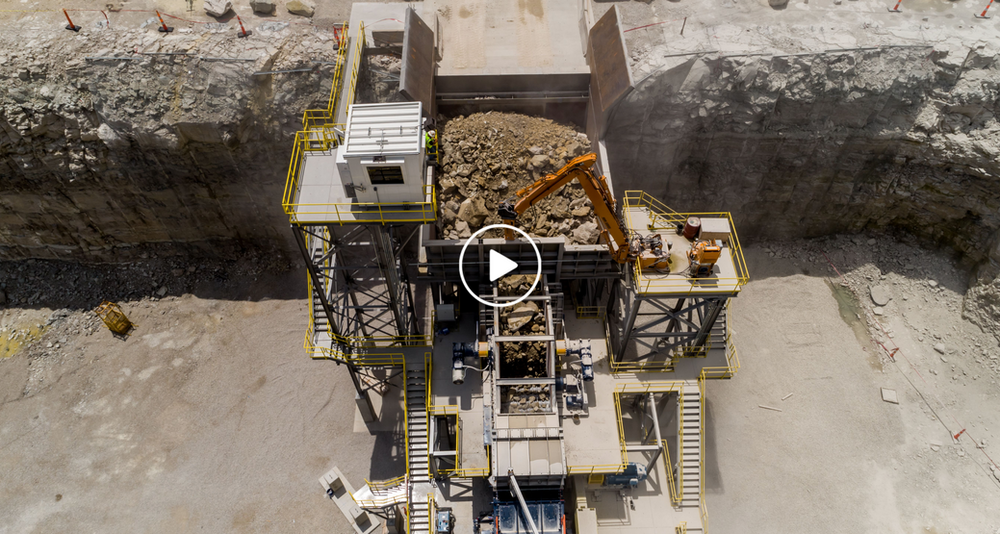 An aerial view of a construction site with a lot of machinery.