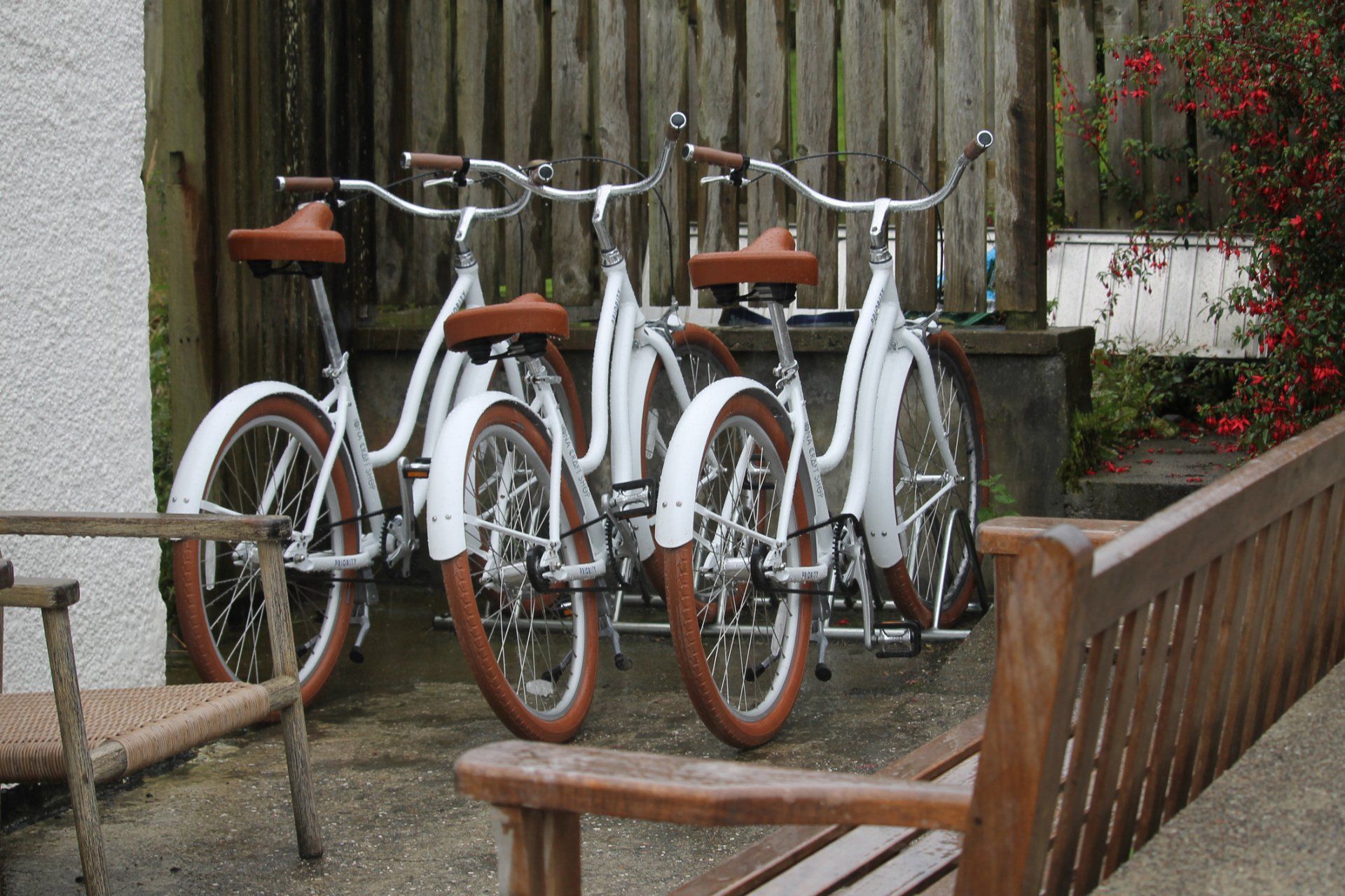 bikes parked by fence