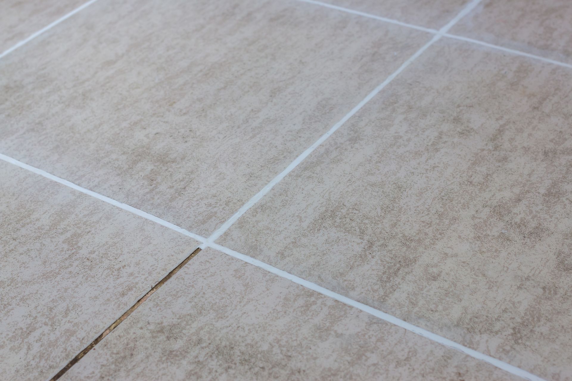 Light Beige Floor Tiles with White Grout Lines — Tampa, FL — A&A's Complete Services, Inc.