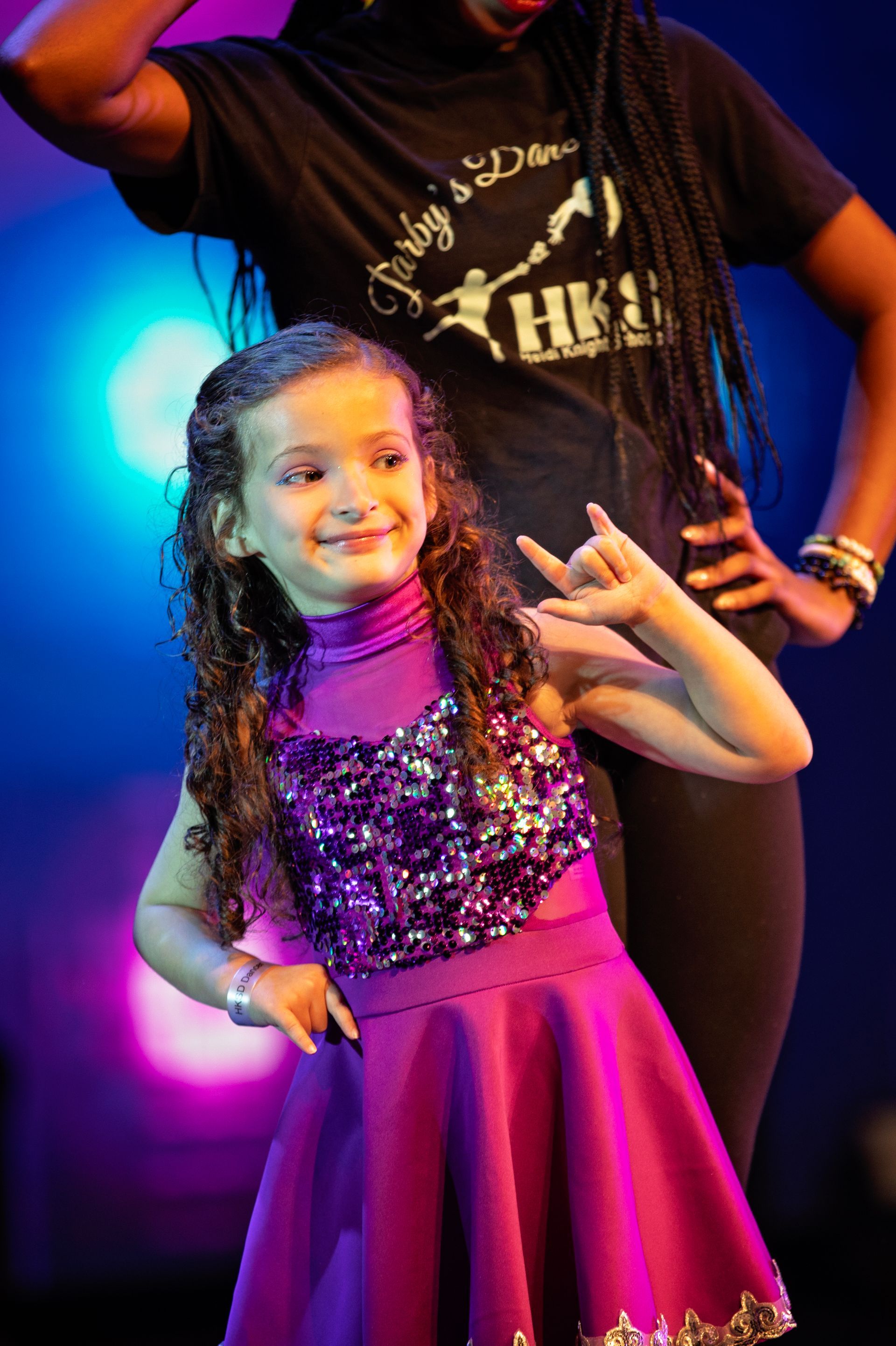 Dancer and teacher on stage