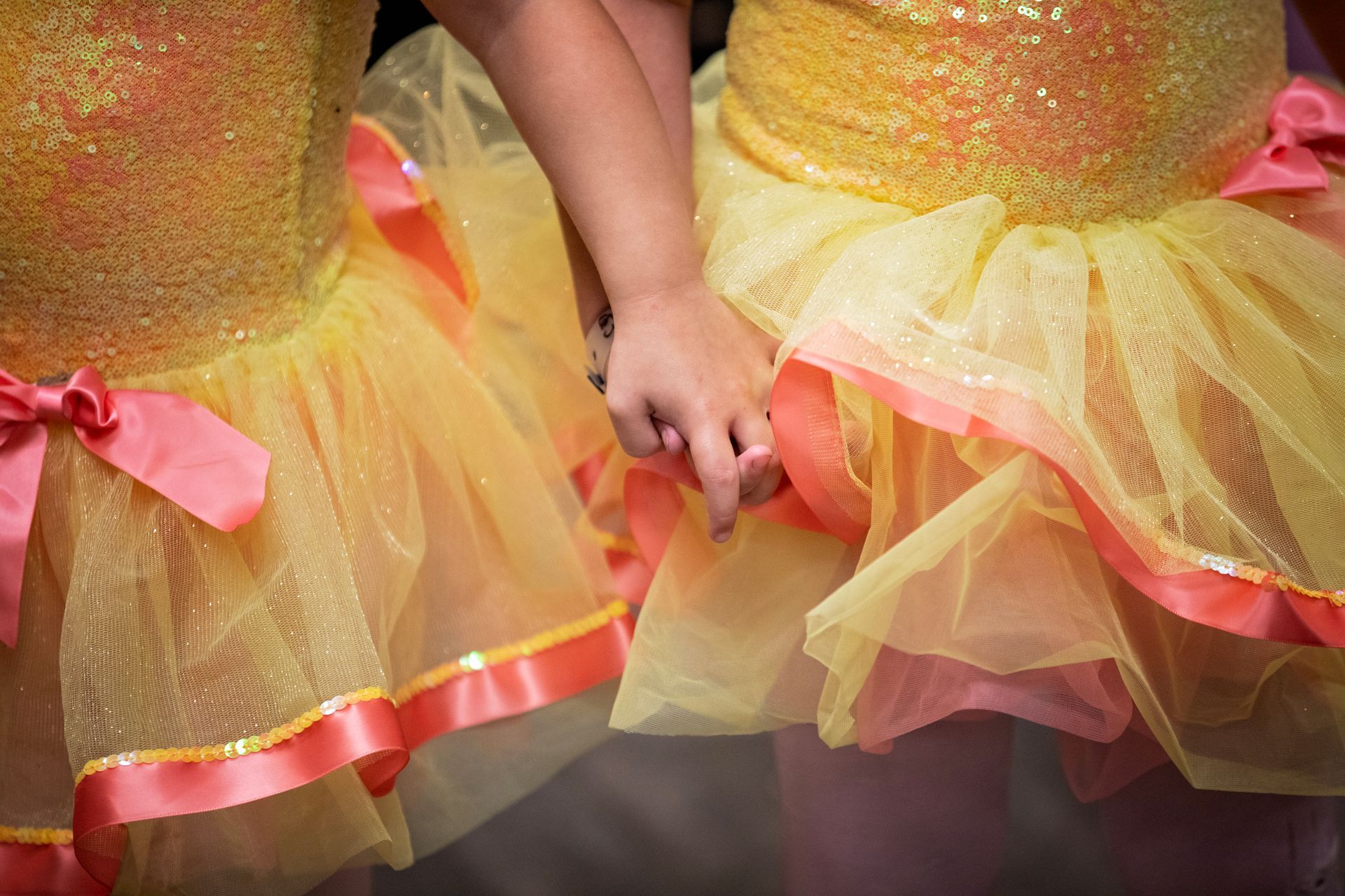 ballet dancers holding hands